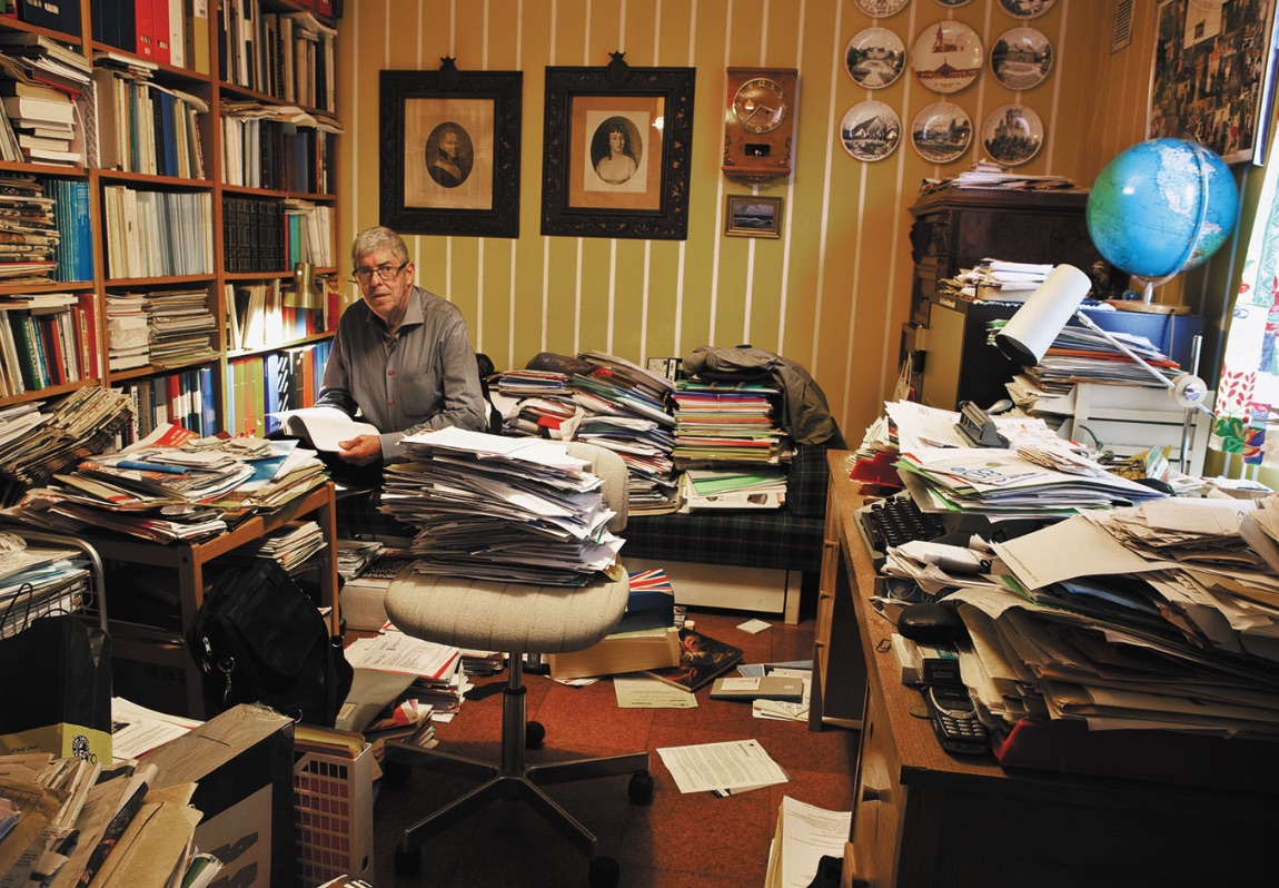 Berkley room with papers and family belongings for careful sorting