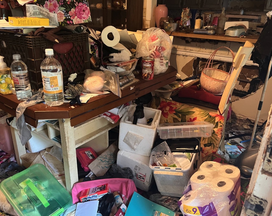 Packed household table and storage items for Berkley cleanout sorting